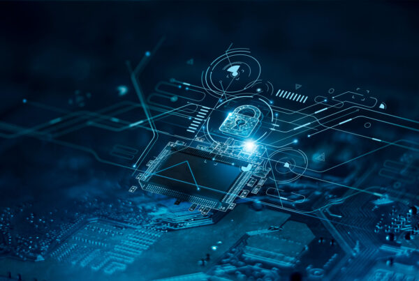 Teal circuit board close-up with a glowing digital padlock and network overlay graphics indicating cybersecurity.