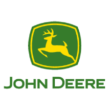 Yellow leaping deer inside a green shield with yellow border, above the text ‘JOHN DEERE’ in green uppercase letters.